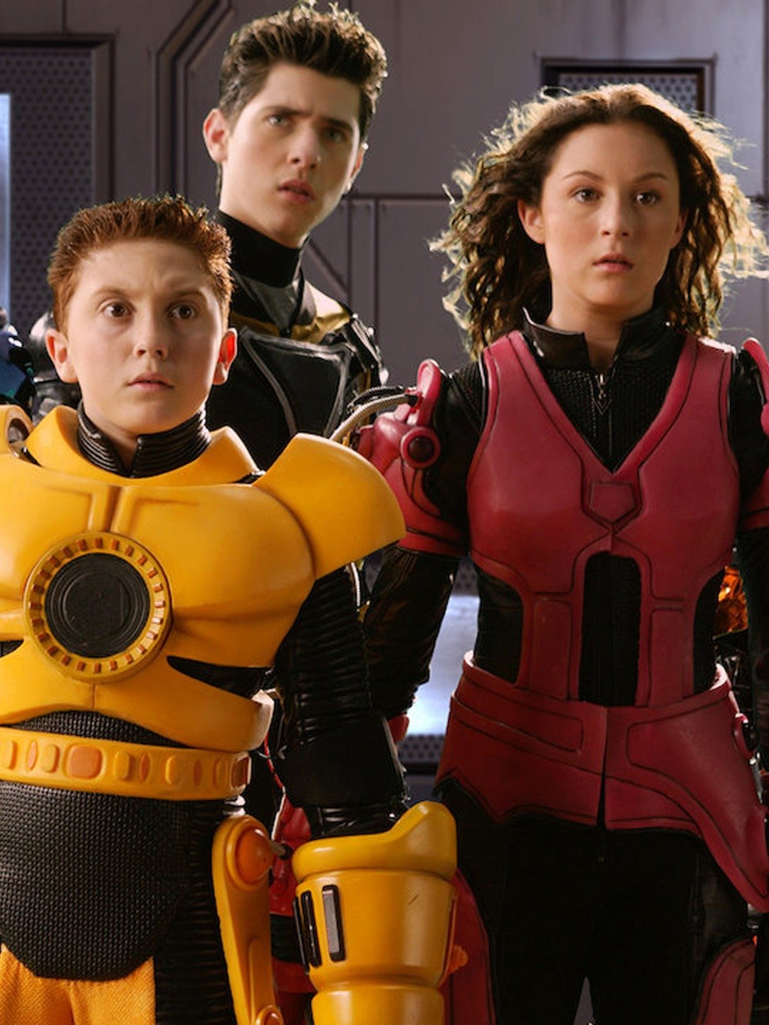 character the girl in the purple suut name from the movie spy kids 3 game over